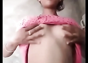 Indian non-specific shows her chest